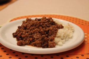 chilly con carne served with rice